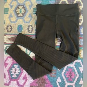 Black Lululemon full length leggings with mesh pattern